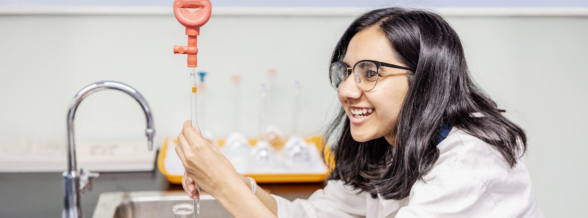 Student working in the science lab at St Andrews College Marayong