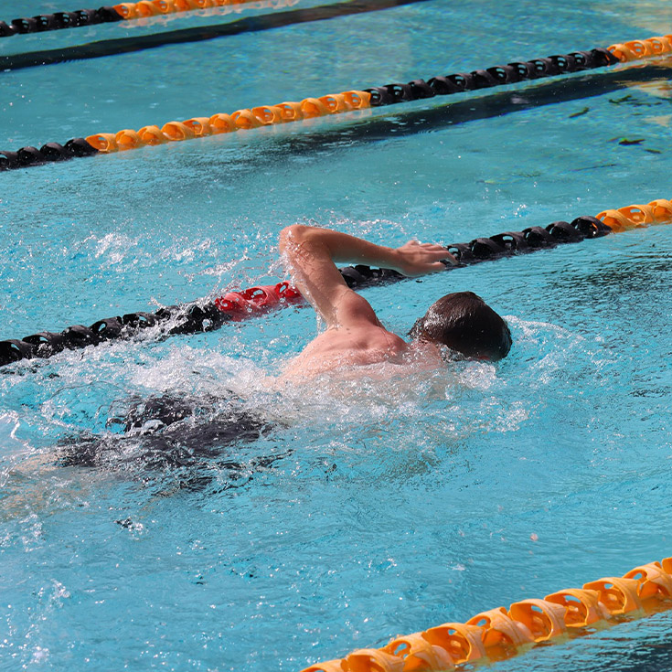 Student from St Andrews College Marayong swimming in a pool